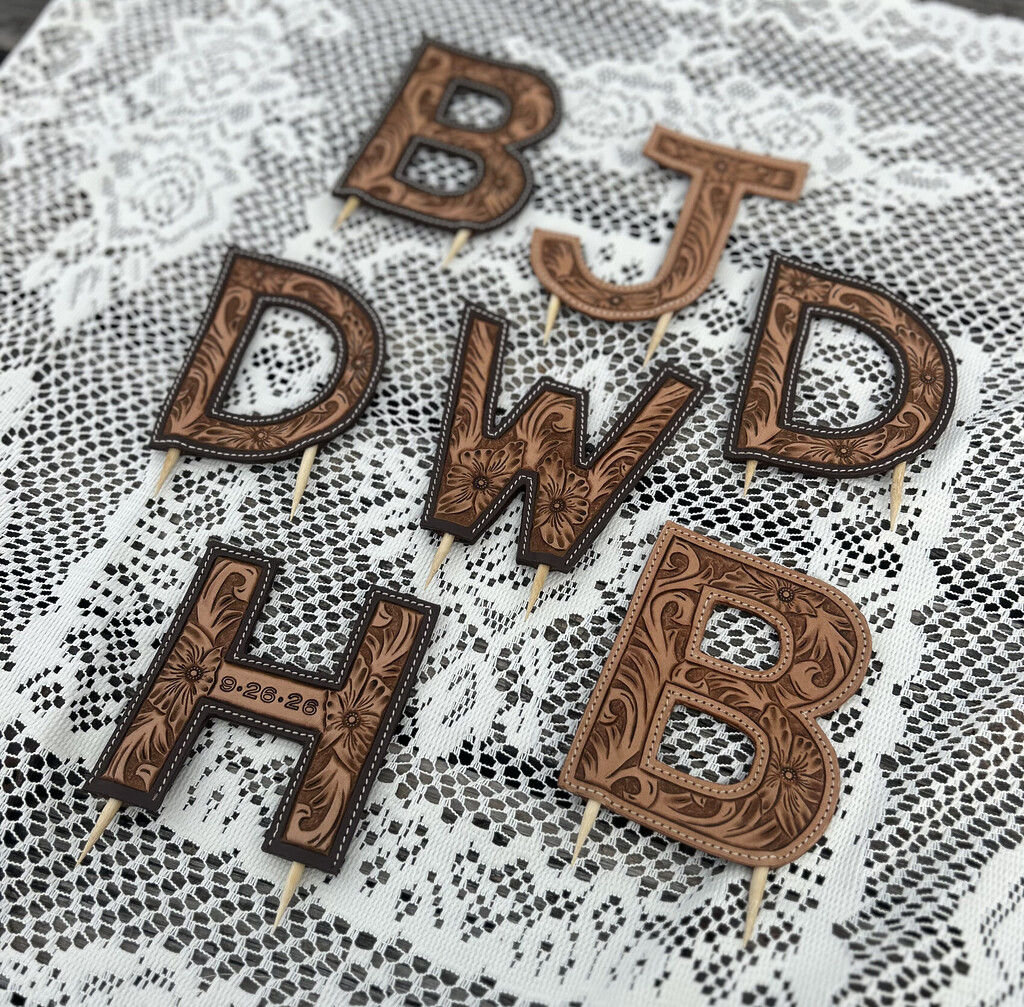Wedding cake toppers made from Hermann Oak A grade tooling leather.